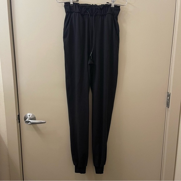 Lululemon Stretch High Rise Jogger Full Length size 2 black activewear travel - Picture 3 of 14